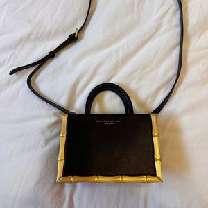 Brandon Blackwood gold bamboo hand bag